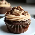 Indulge in Chocolate Bourbon Pecan Pie Cupcakes with Butter Frosting 8 Chocolate Bourbon Pecan Pie Cupcakes with Butter Pecan Frosting